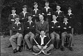 Image12-1 1st XI Hockey Team - Standing: Stephens, Horner II, P. Crook, Pascoe, Orrell, Gaze; Seated: J. Crook, B. Lawes, Mr. Mosey, Marshall I, Hobbs; Fabrega (goalie)