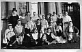 NS-24 L to R standing: Arnold, Warmsley, Papworth, B. Clifford, ?, ?, Rodney Westaway, George Cooper, Ave & Ignatiades I. Kneeling: Teddy Moss, John Cooper, ?, ?, Peter Russell Kamlan Attabai, Adrian Hutchinson, Wilgrove (on chair). Front: ?, Brian Bolton, ? 1078x684 - (132738 bytes)